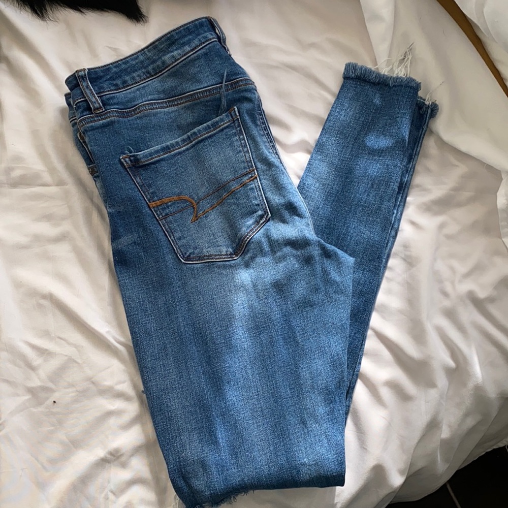 AE, super high rise jeggings 12 regular, medium wash with distressing